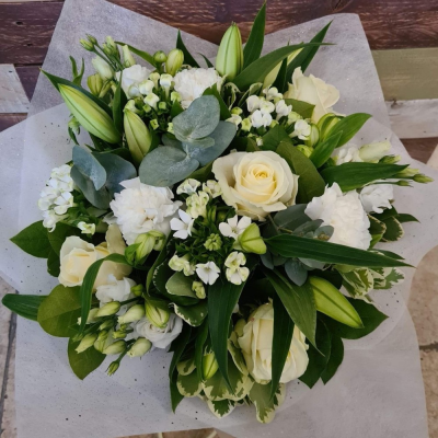 The Classics - Classic White,Cream and Green Mixed Flowers Hand Tied and in a bubble of Water

Contents may vary but it's oh so pretty!