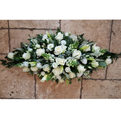 Diamond Spray - ****Please Allow 3-4 Days for this design to be made****

Diamond sprays are made in floral foam arranged to create a Diamond shaped arrangement.

Flowers content and colours may vary from those shown in example images due to price and availability.

Approximate size for standard £50.00 spray is 20 inches in length and approximately 9 inches in width.

Standard price sprays contain basic flowers such as Carnations, Germini, Spray carnations, Limonium and Chrysanths.

For additional flower types such as Roses, Lisianthus, Spray Roses, Hydrangeas, Lilies or other more expensive types the price will start from £65 for standard size tribute.

Can be made in custom colours please add any specific colours into special instructions 

Minimum 1 weeks notice opening time for Lilies, Freesias or Iris as they arrived closed in bud.